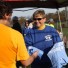 Joan Houshower-Ferree, mother of the late Brian Houshower, gives out championship t-shirts