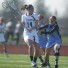 Episcopal Academy's Taylor Trimble fends off a Cape Henlopen defender. Trimble had four goals in the 12-6 win. (Photo by Susan Coote)