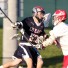 CB East senior defender Blake Weiss (left) is defended by Souderton’s JP Carroll after causing a turnover