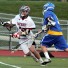 Central Bucks East's Chris Vetter is defended by Downingtown West's Tyler McWilliams during Tuesday's semifinal game. CB East won, 11-7, to advance to the District 1 finals vs. two-time defending champion Conestoga