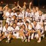 Conestoga celebrates its third straight District 1 championship Thursday after defeating Central Bucks East, 10-4. The Pioneers are ranked third in the LaxPower Computer ranking (photo by Tim Flatley)
