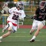 Central Bucks East's Connor McSherry (left), who had two goals ans four assists, is defended by St. Joseph's Prep's Andrew Benedict