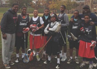 Chase Young (second from left) is flanked by Maverik's Jovan Miller, LEAPS players and co-founder-Maverik sales rep John Christmas (far right)