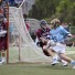 haverford School's Henry Blynn, who had seven goals and two assists, turns the corner vs. Conestoga's Patrick Riley during Saturday's 13-8 win (Photo by Rene Schleicher)