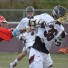 Conestoga's Tyler Brooke is checked by two Hill Academy players during Saturday's loss