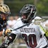 Conestoga's Connor Frisina (right) scored three goals, including his 100th career tally, in Saturday's 5-4 win over La Salle (Photo by David Eaton)