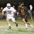 Lehigh's Ty Souders (Emmaus) defends Joe Cummings during Sunday's loss to Maryland. (Photo by Rene Schleicher)