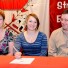 Kaitlin Crouthamel (center) is flanked by her parents while signing a Letter of Intent to play at Millersville
