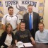 Upper Merion senior Kupecky was joined in his signing Wednesday by his parents, Julie (left) and Roman (right), as well as Upper Merion coach Brady McCormick (top left) and Jonathan Bauer, Principal at Upper Merion.