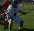 Mesa Fresh defenseman Jack Twohig (right) fights for a groundball during Monday's 7-3 championship victory over FCA at the Dick's Sporting Goods Tournament of Champions at Wesley Chapel, Fla. (Photo by Scott Growney)