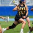 Shoreham-Wading River (NY) senior Alex Fehmel, a Fairfield signee and multiple state champion with the Long Island power, has helped thrust the use of protective headgear into the limelight