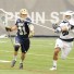 Notre Dame's Liam O'Connor (Haverford School) is defended by PSU's Kessler Brown (For Phillylacrosse.com)