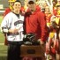Henderson senior Owen Evans received the "Bauer Blue Collar" award for his performance in Thursday's win over West Chester East. East coach Jim Schorn awards the honor.