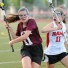 Conestoga's Blake Hamblett is defended by Harriton's Maura Henderson during Wednesday's PIAA contest